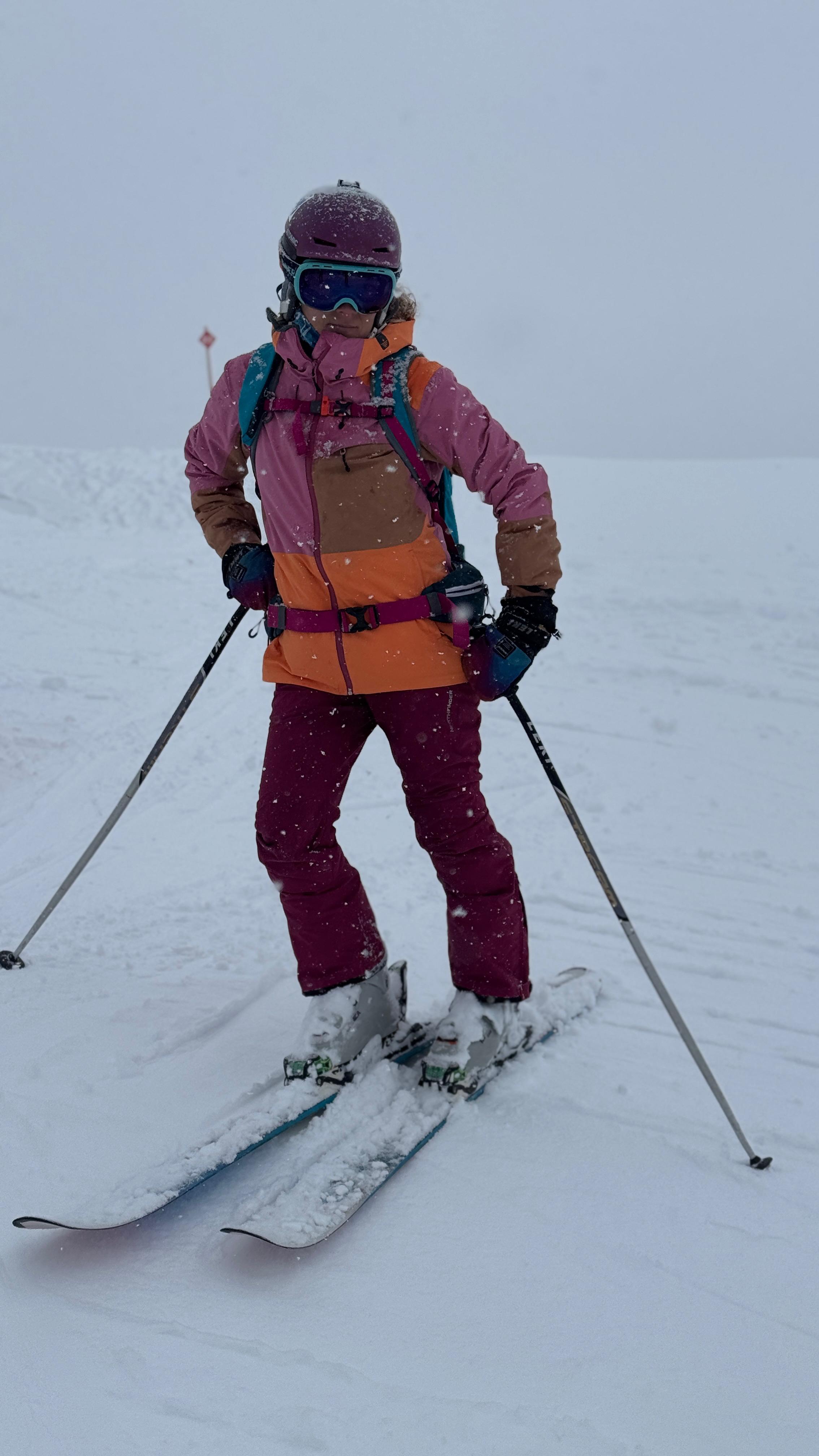 Csilla standing on skis in fresh snowfall