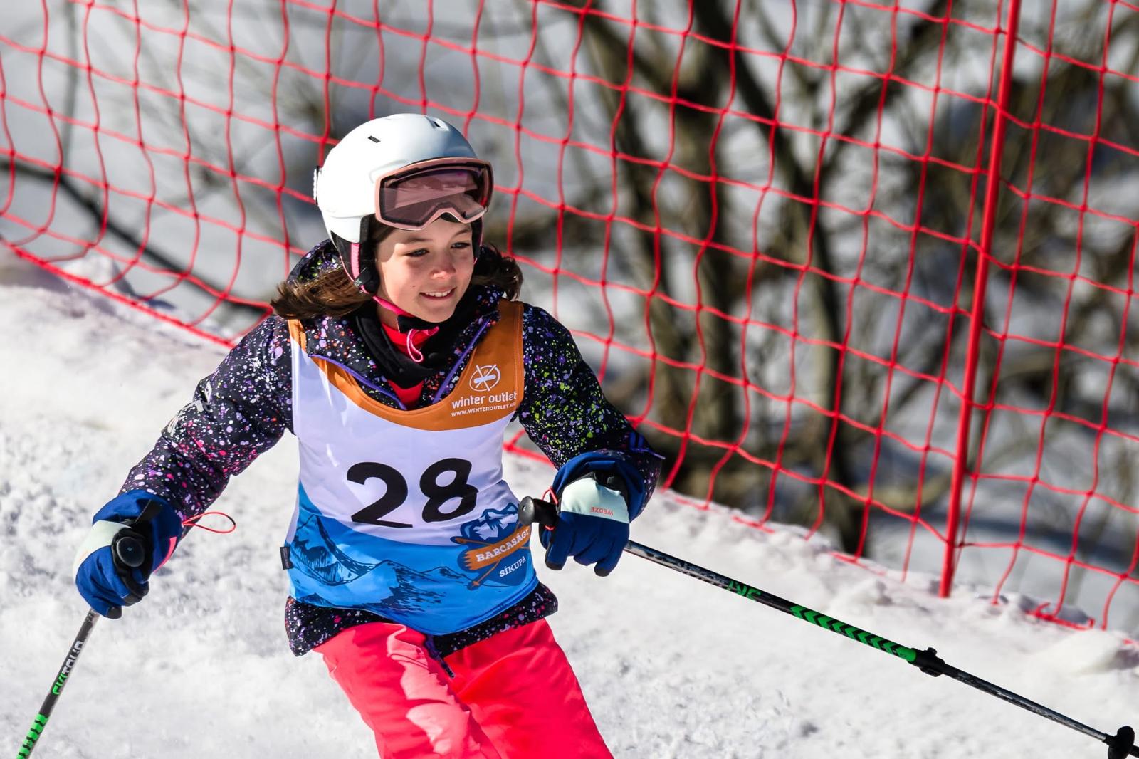 A young ski racer near the finish area